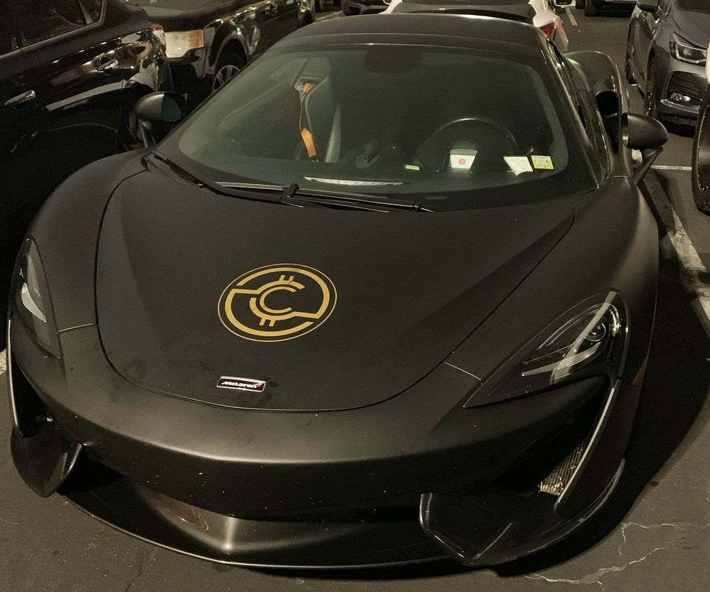 Which cryptocurrency exit scam bought this McLaren?