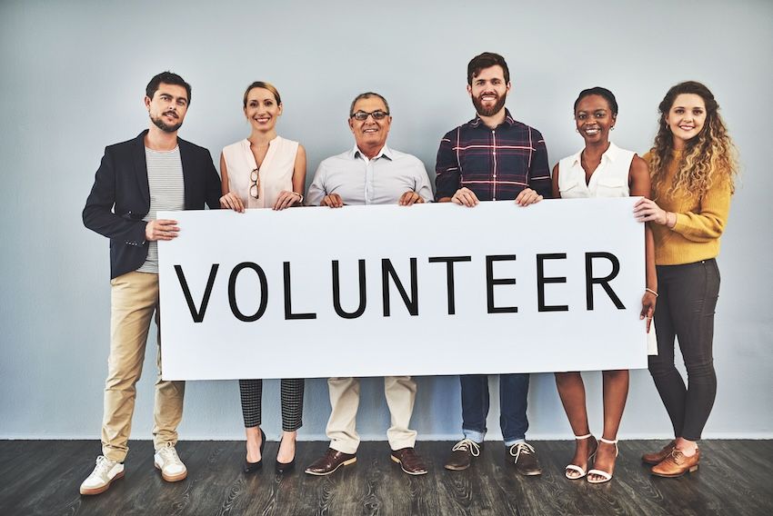 Group-Holiding-Volunteer-Sign-EDIT-GettyImages-1132766132.jpg Group-Holiding-Volunteer-Sign-EDIT-GettyImages-1132766132.jpg